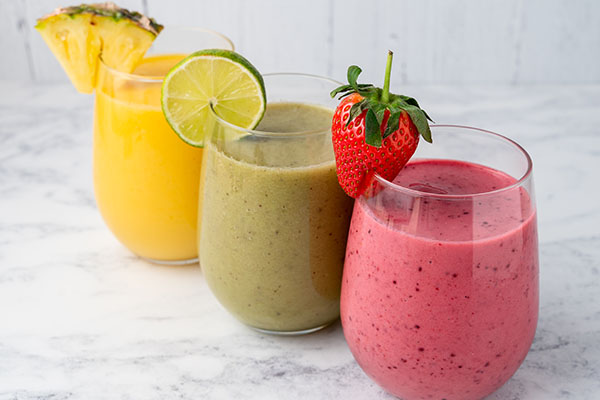 A variety of fruit smoothies.